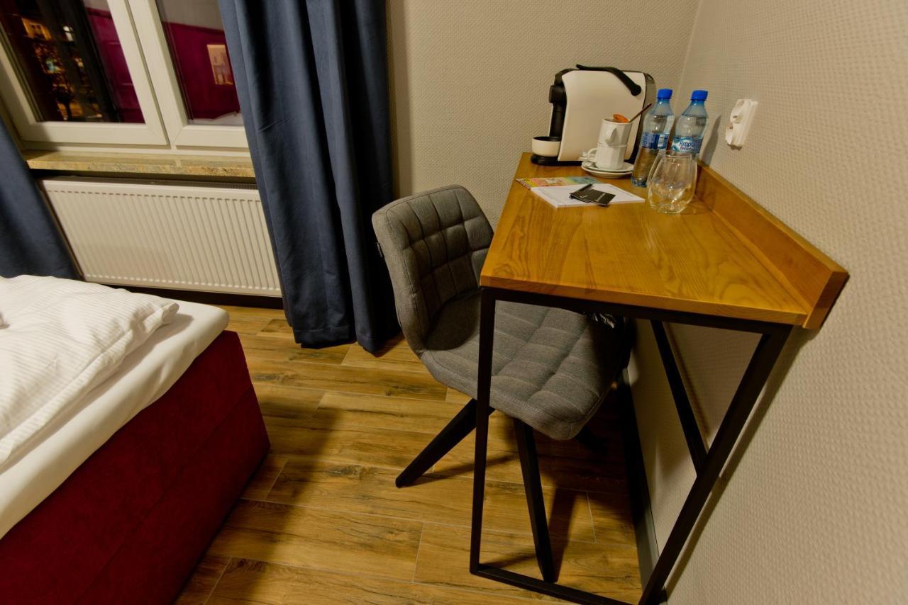 Apartsuites I Sorau Жары Экстерьер фото A Nespresso machine in a hotel room